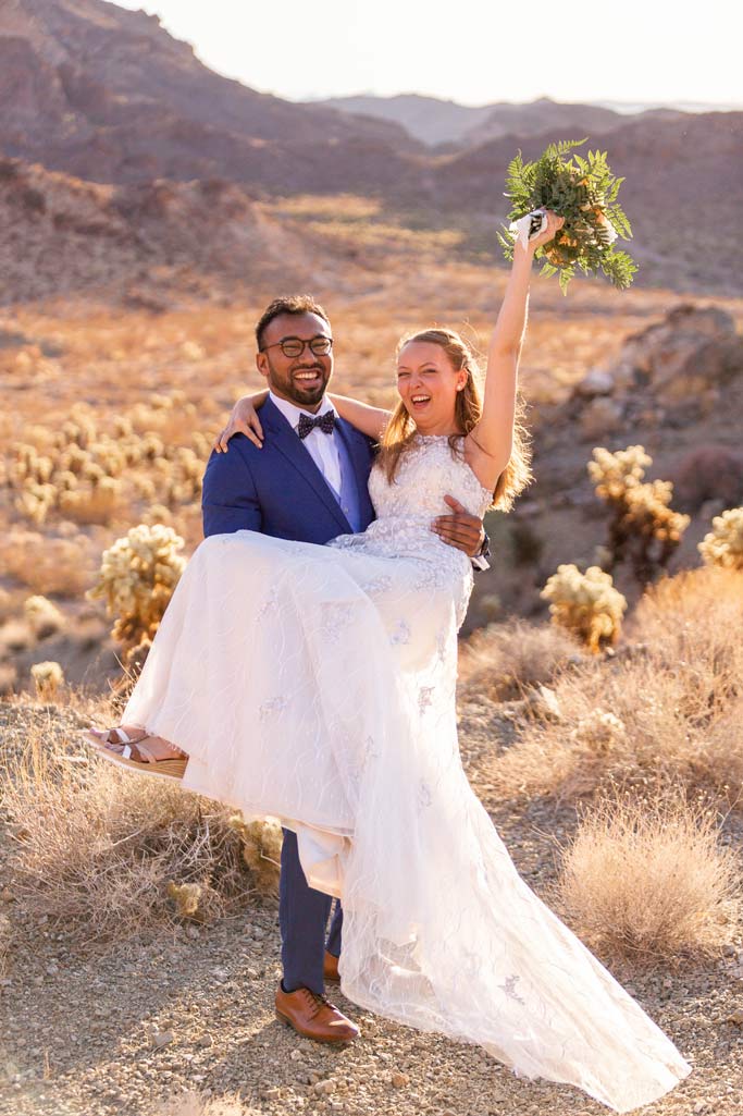 las vegas eloping couple celebrating in the canyon