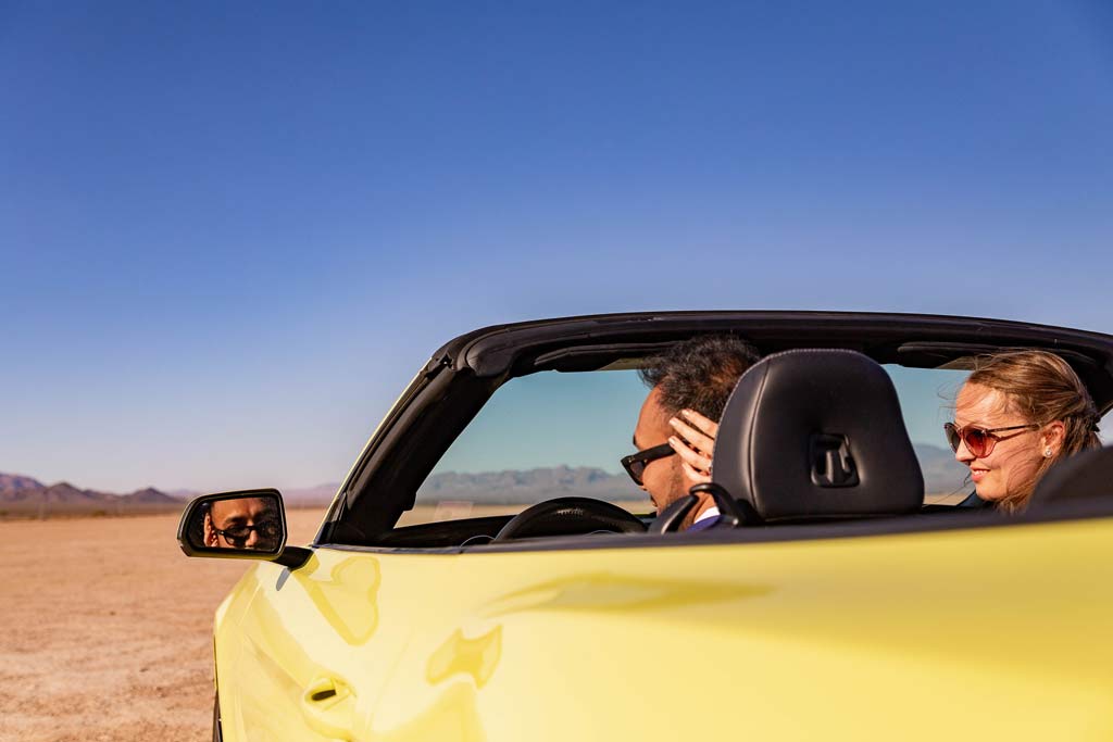 las vegas eloping couple in cool car rental