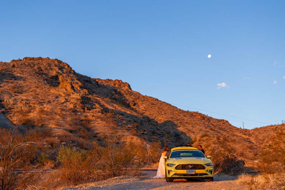 las vegas elopement in the canyon with a yellow mustang