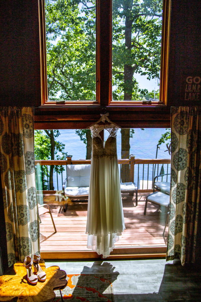 wedding dress hanging in st. cloud lake house