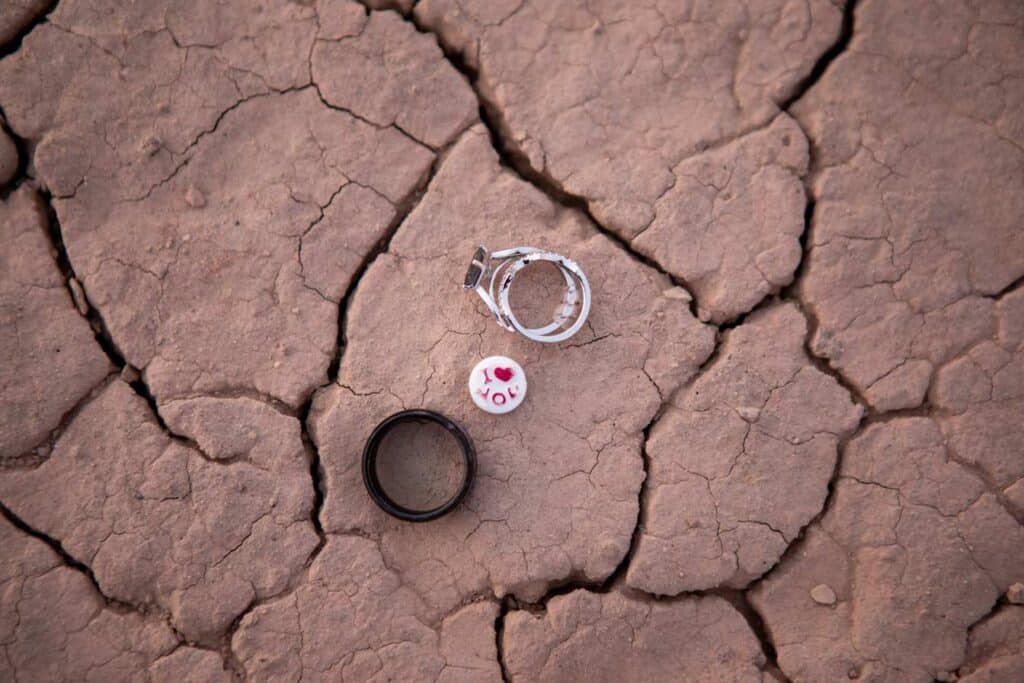 dry lake bed texture with wedding rings